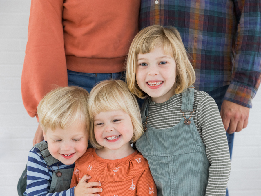 Studio family portrait fun session with confetti at Love Tree Studios.