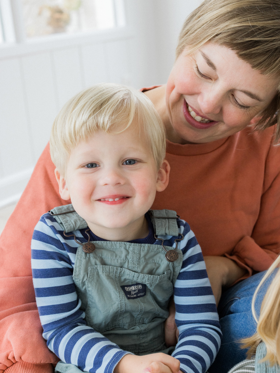 Family session filled with laughter and studio family portrait fun at Love Tree Studios.