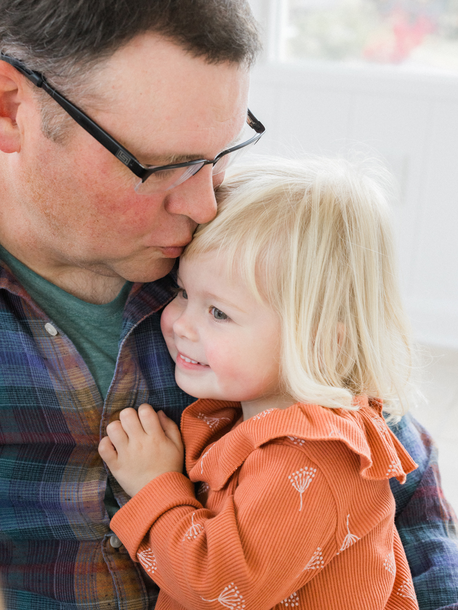 Playful studio family portrait fun captured by Love Tree Studios.