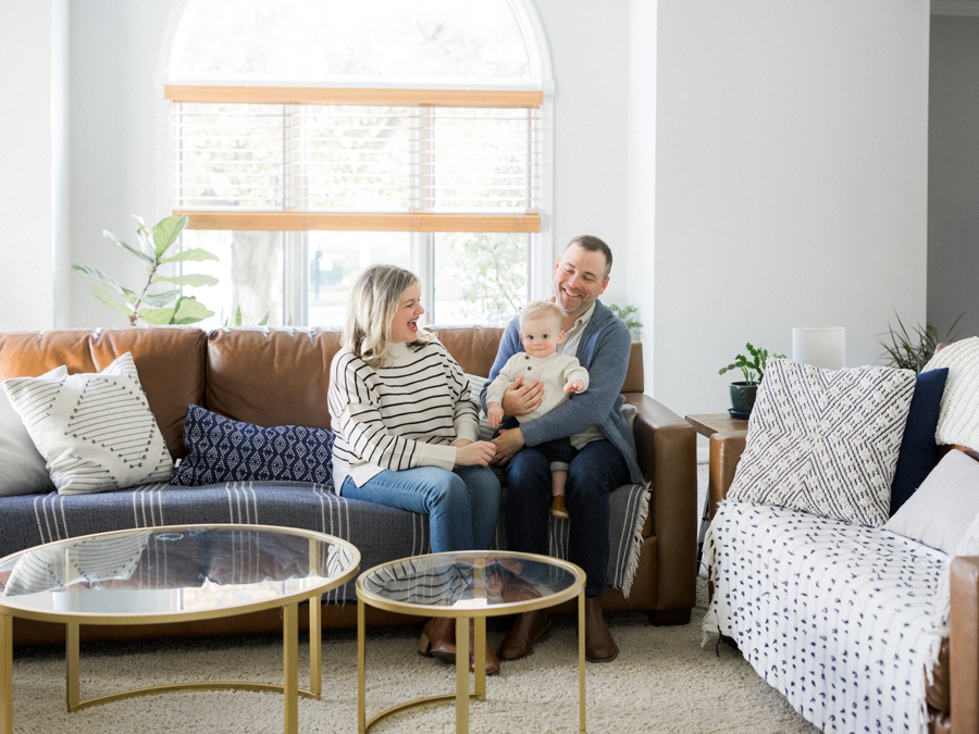 Schaffner family enjoying a relaxed home session with natural light, captured by Love Tree Studios in Columbia, MO.