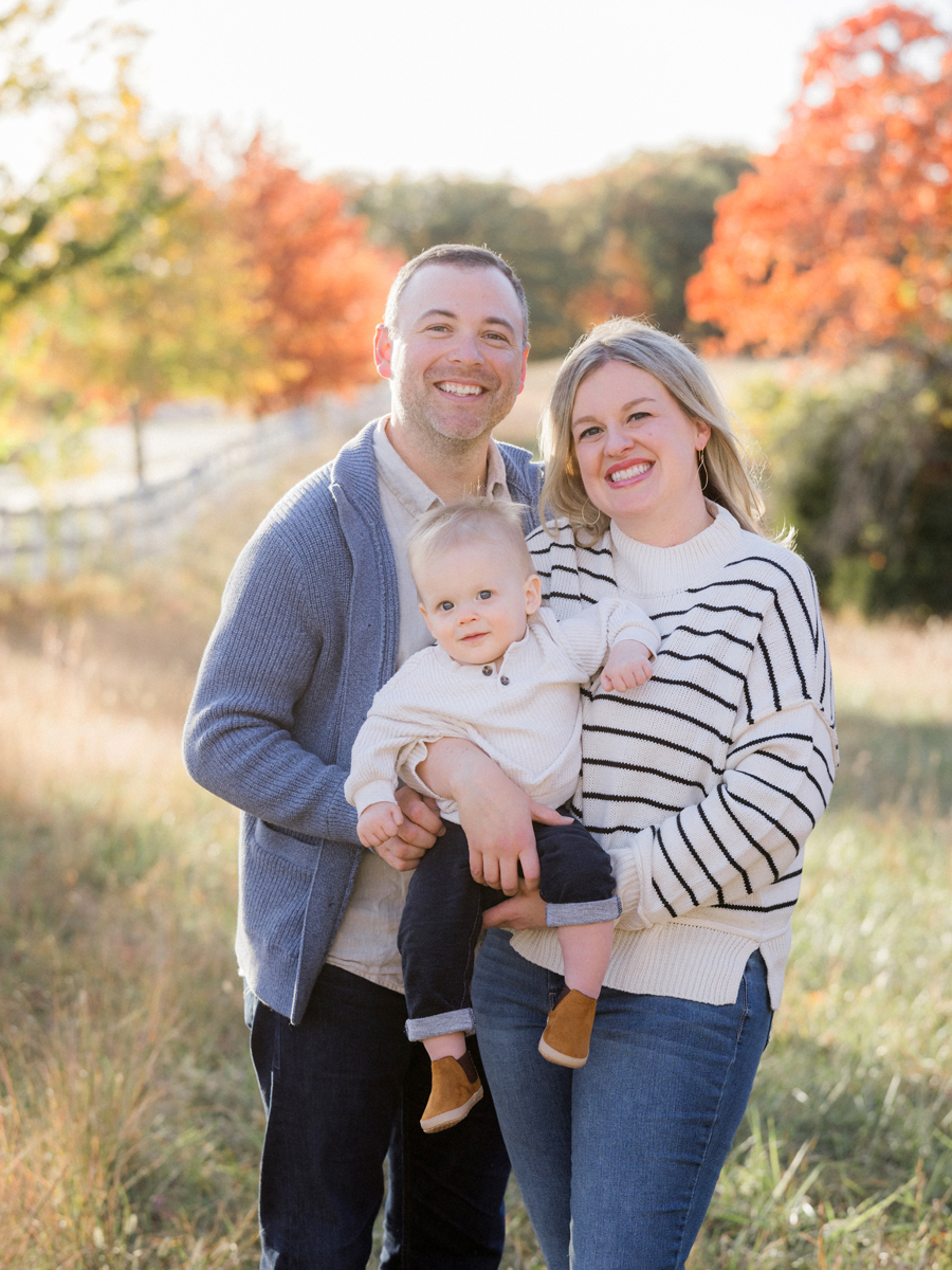 Golden-hour family portrait, showcasing cozy and vibrant photography by Love Tree Studios in Columbia, MO.