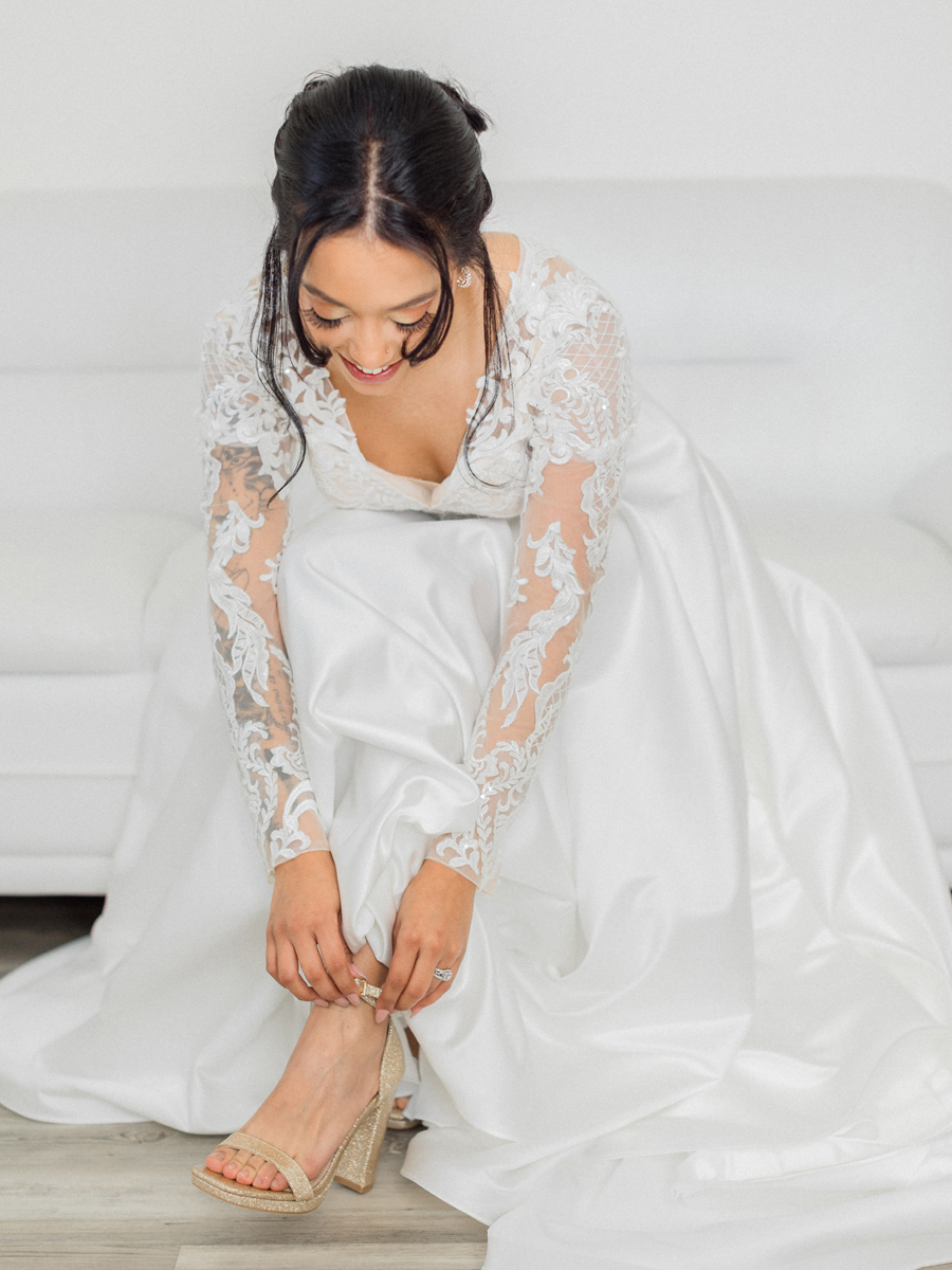 Bryanna getting ready on her wedding day at Cooper's Ridge Wedding Venue, photographed by Love Tree Studios.