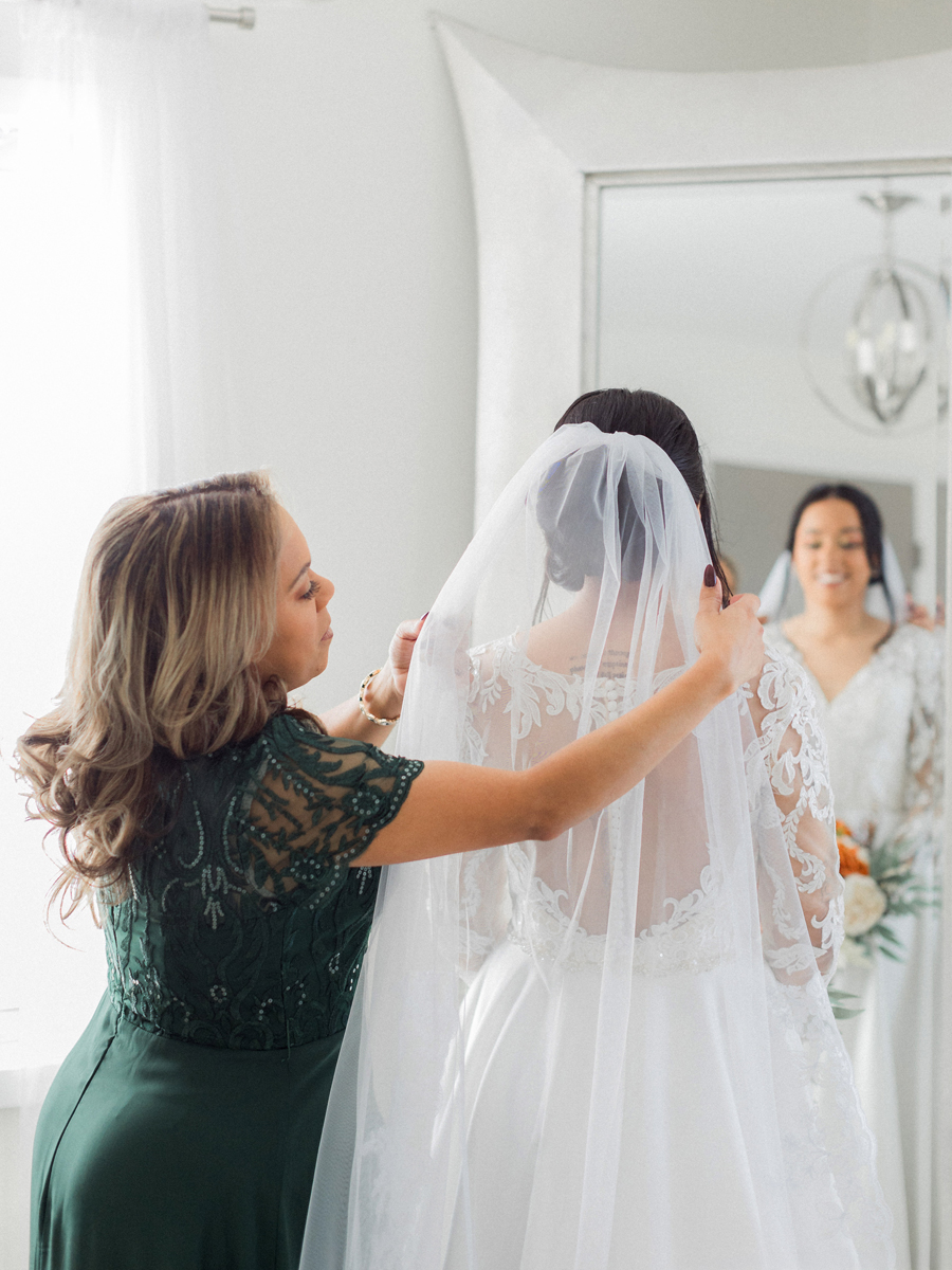 Final touches as Bryanna prepares for her big day at Cooper's Ridge Wedding Venue, photographed by Love Tree Studios.