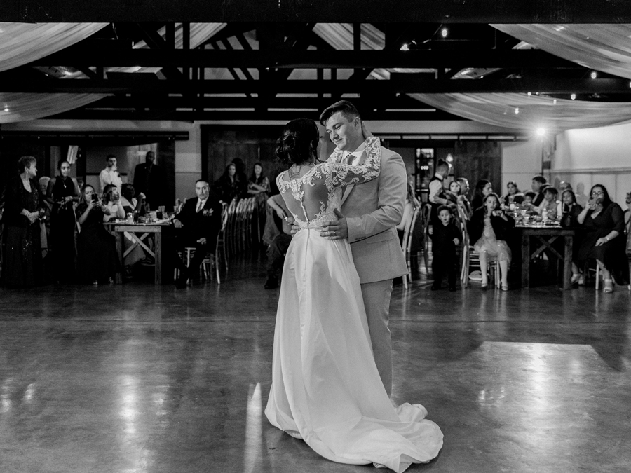 Bride and groom’s first dance at Cooper's Ridge Wedding Venue, photographed by Love Tree Studios.