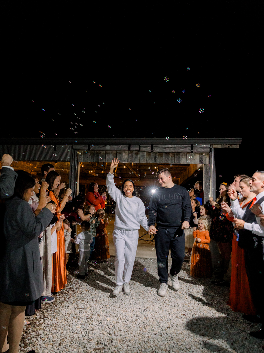 Guests celebrating at Cooper's Ridge Wedding Venue in Boonville, Missouri, photographed by Love Tree Studios.