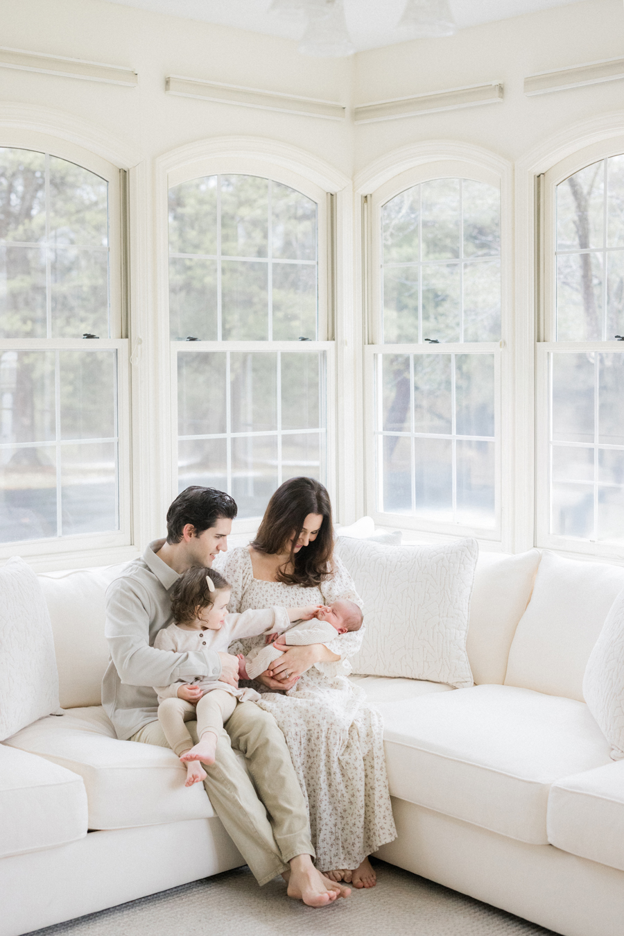 A cozy at-home newborn session featuring baby Harry and his loving family by Columbia Missouri Newborn Photographer - Love Tree Studios.