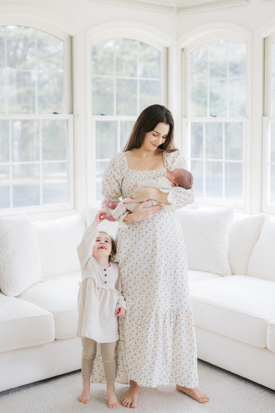 Love Tree Studios captures a joyful family moment with baby Harry and his sister in Columbia Missouri.