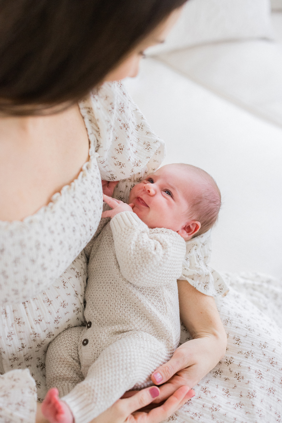 Newborn photography session in Columbia Missouri featuring baby Harry’s serene expressions - Love Tree Studios.