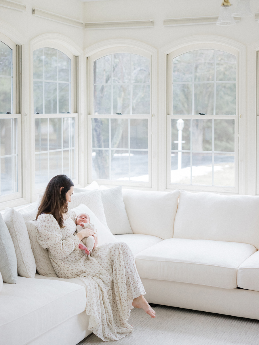 Love Tree Studios captures a serene mother and son moment during baby Harry’s Columbia Missouri newborn session.