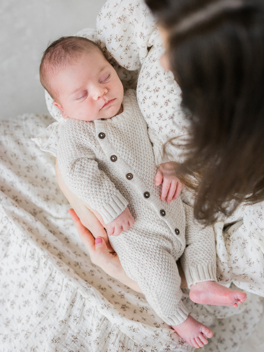 Columbia Missouri Newborn Photographer captures baby Harry swaddled in soft textures for a timeless newborn portrait - Love Tree Studios.