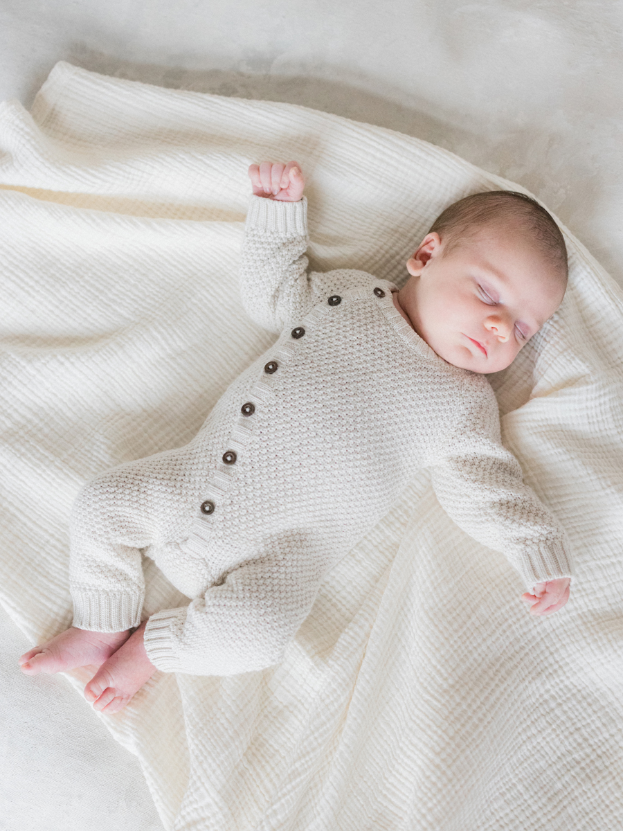 A peaceful newborn portrait of baby Harry by Columbia Missouri Newborn Photographer - Love Tree Studios.