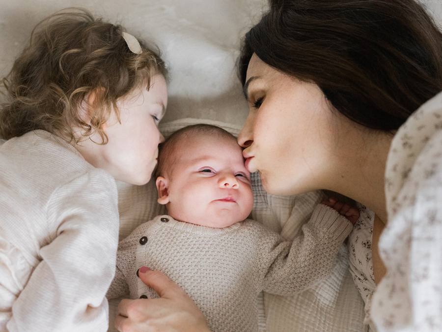 Love Tree Studios captures baby Harry’s first moments at home in a cozy Columbia Missouri Newborn Photography session.