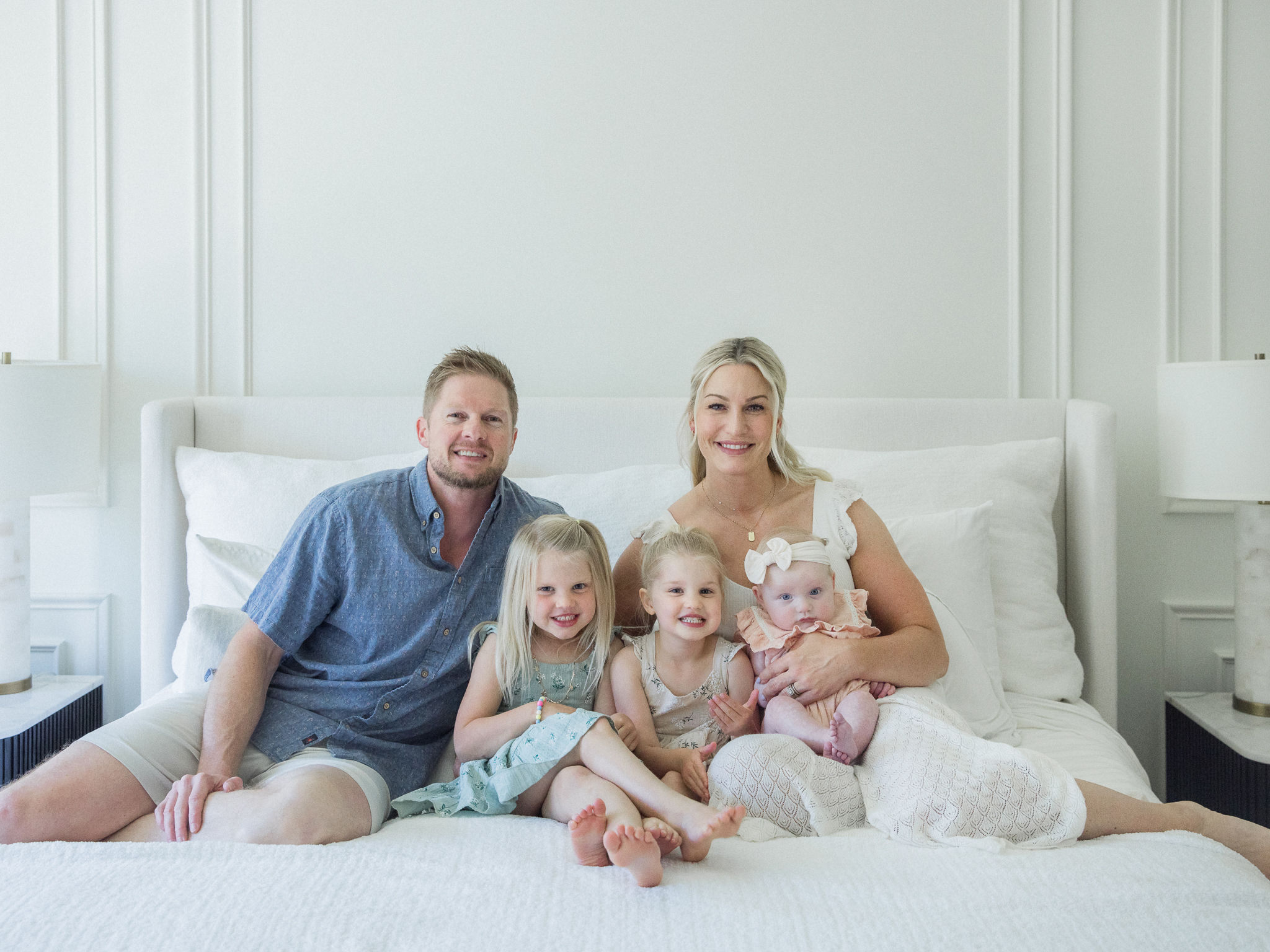 Family lifestyle photo session by Love Tree Studios in Missouri capturing newborn moments at home.