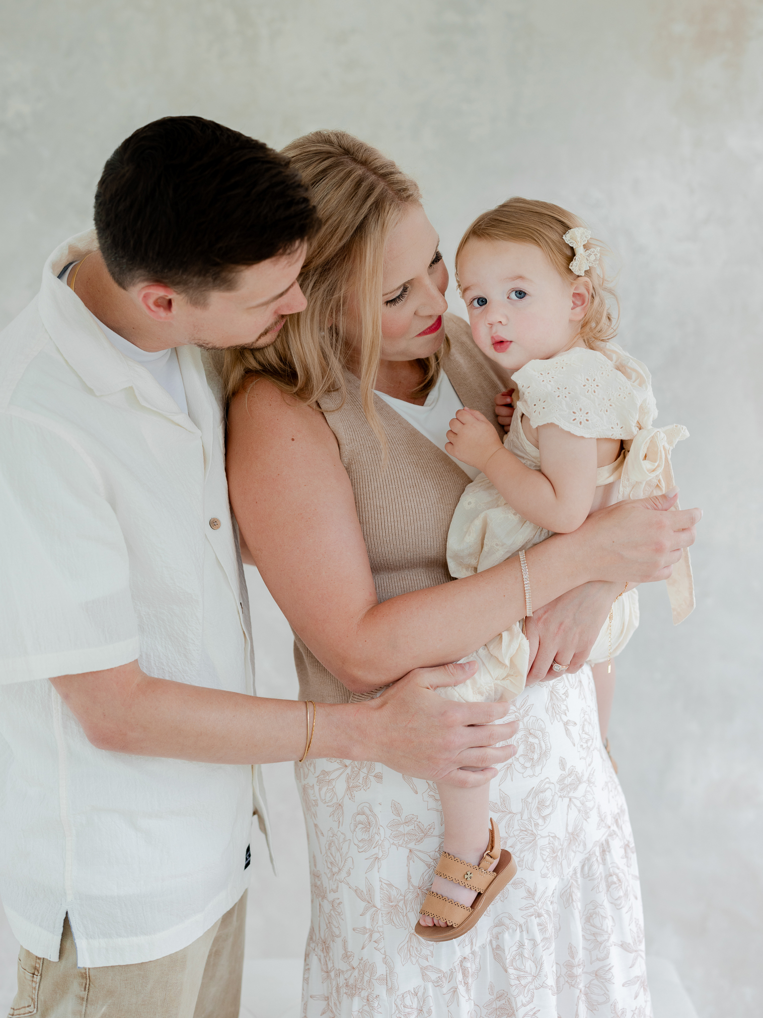Sweet moment during the Bradley family’s session, captured as part of their studio family photos Missouri with Love Tree Studios.
