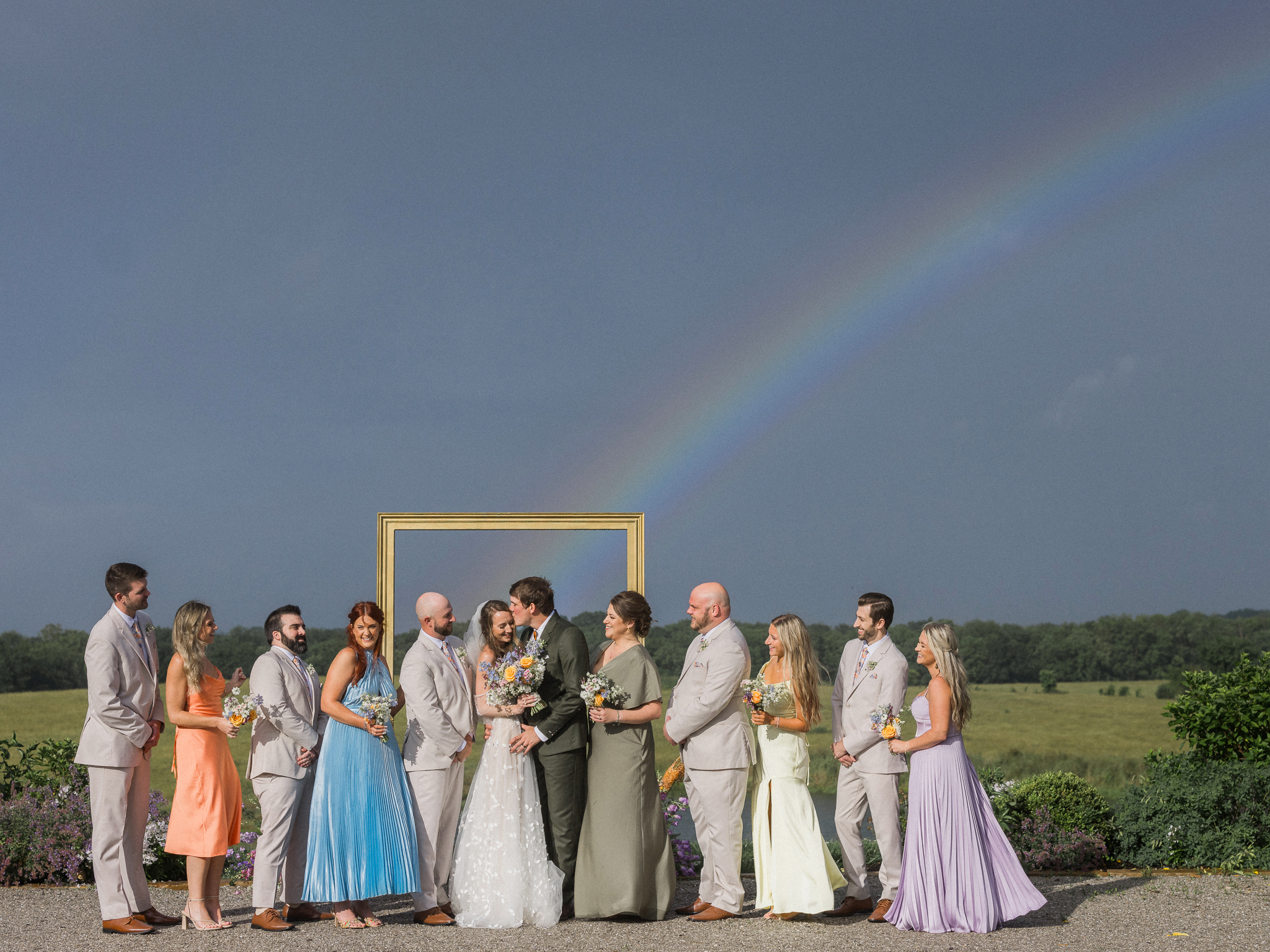 Mother Nature’s surprise—this stunning rainbow framed their Blue Bell Farm wedding party perfectly.