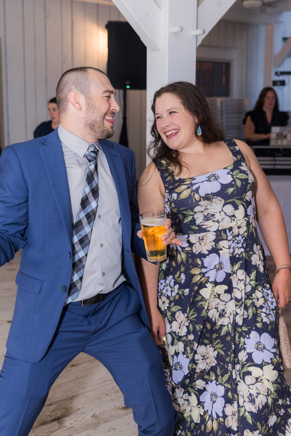 The dance floor is full of energy and laughter at this unforgettable Blue Bell Farm wedding.