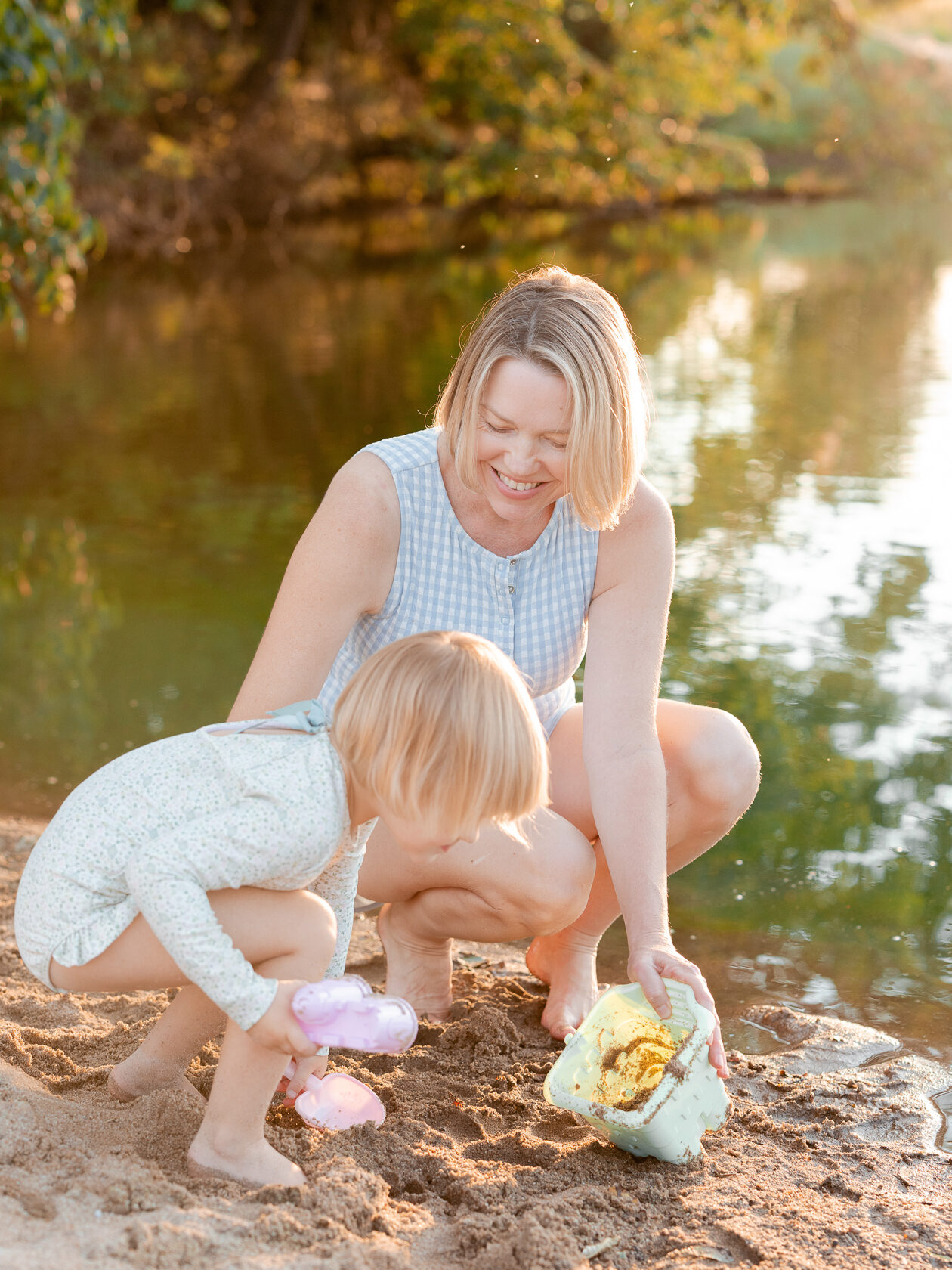 Mother and daughter playing in the sand — Love Tree Studios family portraits in Missouri.